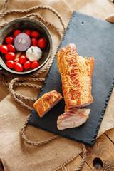 Smoked meat and vegetables in a vintage pan 