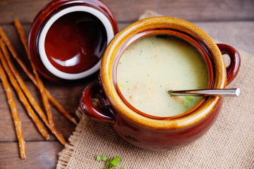 Cheese soup and bread sticks 