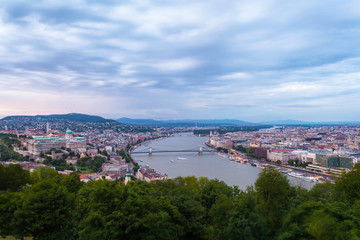 Fototapeta premium Evening panorama of Budapes from Gellert Hill with a beautiful sunset sky