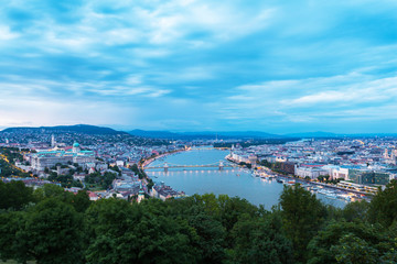 Fototapeta na wymiar Evening panorama of Budapes from Gellert Hill with a beautiful sunset sky