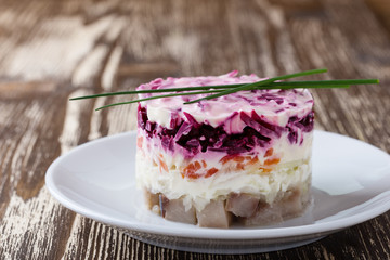 Homemade dressed pickled herring