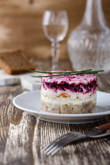 Homemade dressed pickled herring