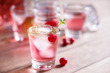Shot with natural cranberry and vodka 