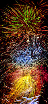 Fireworks collage in vertical format.