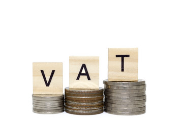 Stack money coin with vat word