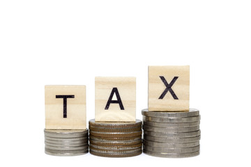 Stack money coin with tax word