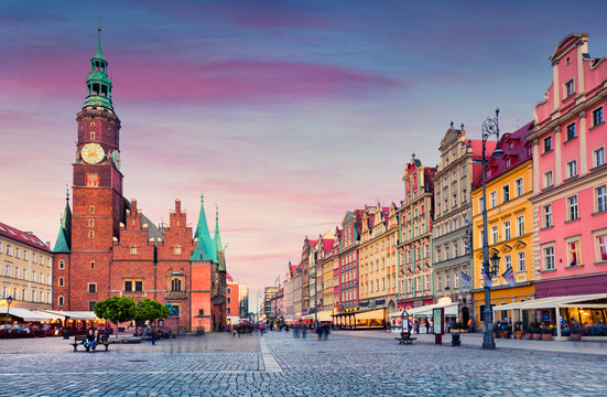 Colorful evening scene on Wroclaw Market Square with Town Hall.