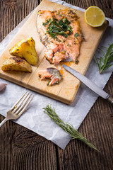 Trout steak with baked potatoes


