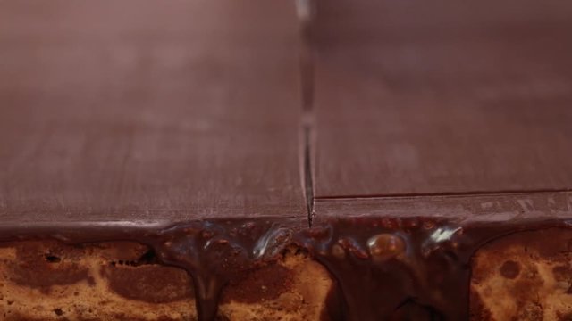 Cutting a snickers cake