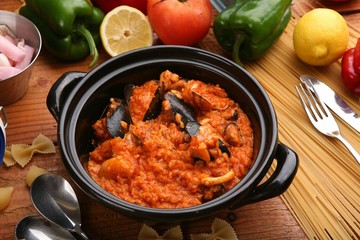 seafood tomato risotto on hot pot