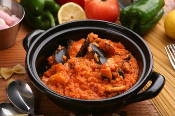 seafood tomato risotto on hot pot