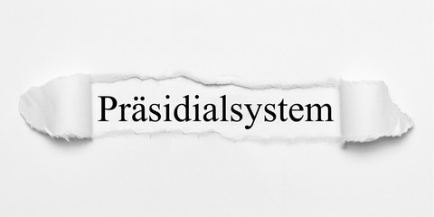 Obraz premium Präsidialsystem auf weißen gerissenen Papier