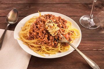 Plate of pasta with meat and tomato sauce