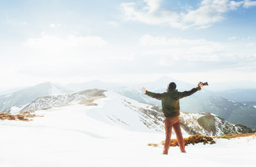 Tourist in winter mountains. Ukraine. Carpathians