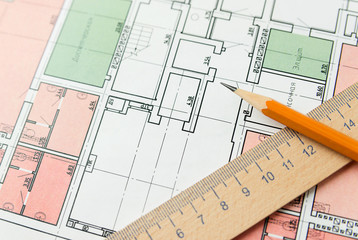 On the sheet of the drawing is a pencil with Notepad