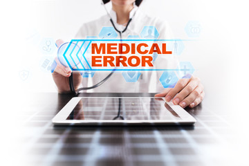 Medical doctor using tablet PC with medical error medical concept.
