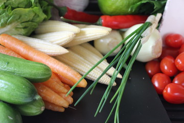 fresh vegetables and herbs, oregano, sage, chive, parsley, dill, onion, cucumber, green vegetables,  red vegetables, tomatoes, peper, red peper,  
