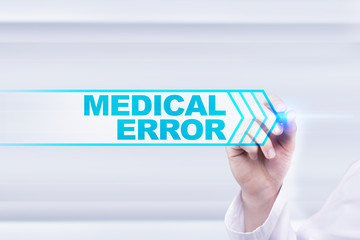 Medical doctor drawing medical error on the virtual screen.