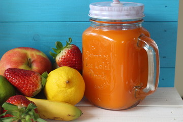 fresh fruits vegetables and fresh juice, lemon, apples, banana, strawberries, carrot, lime, 