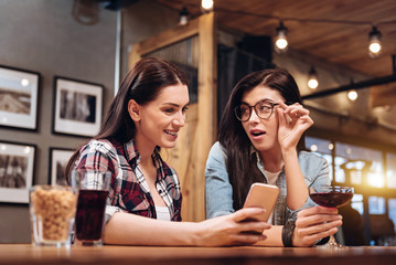 Attractive female looking at her best friend