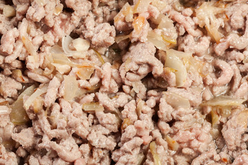 Minced meat fried with onions and garlic in the frying pan. Prep