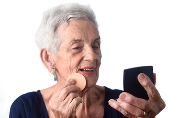 Senior woman make-up face on white background