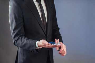 Businessman with a phone in his hand.