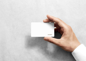 Hand hold blank white loyalty card mockup with rounded corners. Plain vip mock up template holding arm. Plastic discount namecard display front. Gift offset card design. Loyal service branding.