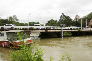 Fireboat floating chanthaburi river while water fast and severe because flash flood after rainy at Old Town Chanthaboon