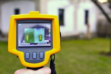 Recording Heat Loss of the House with Infrared Thermal Camera in Hand.