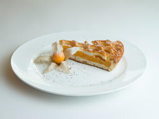 apricot pie on a white plate