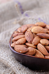 Almonds on sackcloth background