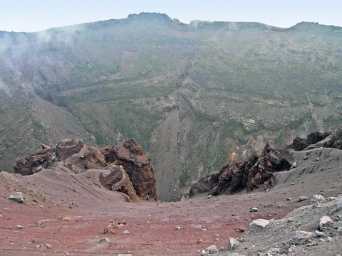 The smoking crater of Vesuvius.