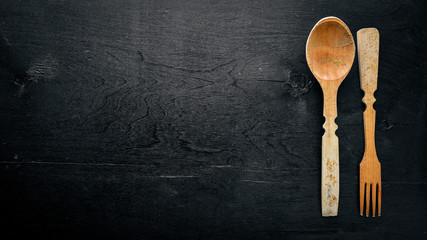Kitchen tools. On Wooden background. Top view.