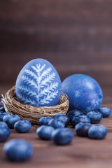 natural easter egg dyeing blue with blueberries