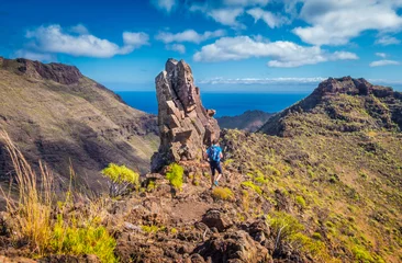 Poster Im Rahmen Hiker on a trail in the Canary Islands, Spain © JFL Photography