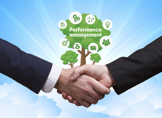 Technology, the Internet, business and network concept. Businessmen shake hands: Performance...
