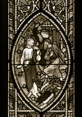 Fototapeta na wymiar Stained Glass in Worcester Cathedral - The East Window close up Bottom W