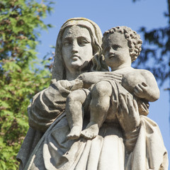 Fototapeta na wymiar statue of the Virgin Mary with the baby Jesus Christ (Faith, religion, sin, salvation concept)