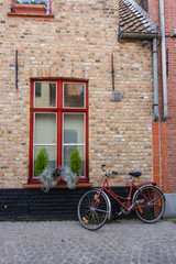 Fototapeta na wymiar Architecture of bicked street of Brugge town in Begium