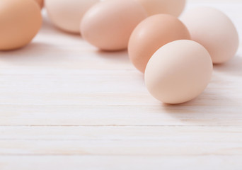 eggs on white wooden background