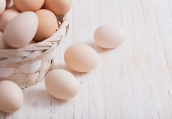 eggs on white wooden background