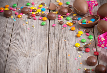 Chocolate Easter Eggs Over Wooden Background