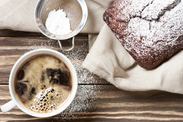 Cup of coffee and chocolate cake