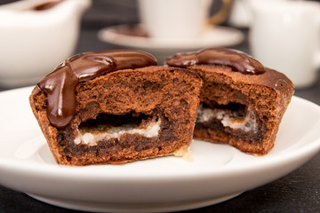 Chocolate french dessert cake mi-cuit on white plate