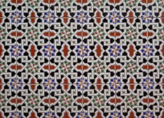 Wall tiled with colorful geometrical pattern