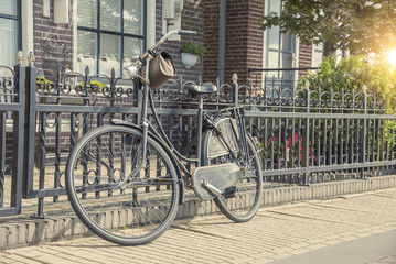 Fototapeta na wymiar Bicycle on the city street in Amsterdam.