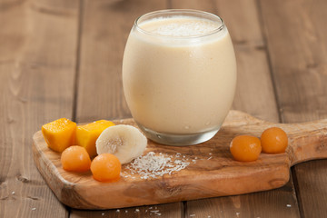 Smoothie With Banana, Mango, Melon, Desiccated Coconut, Chia Seeds.