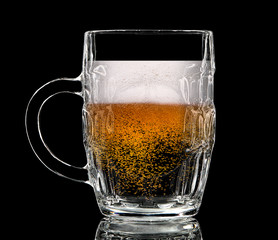 Silhouette of colorful beer glass with on black background