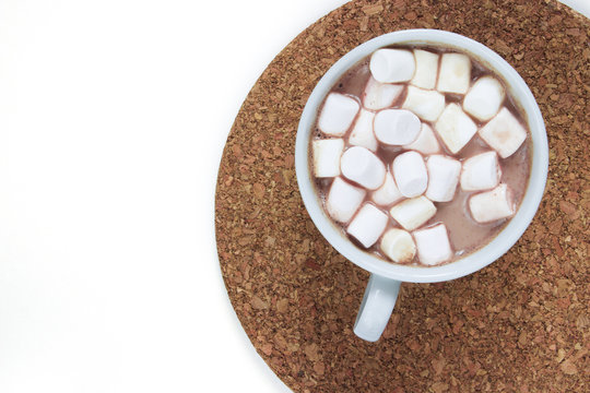 Mug filled with hot chocolate and marshmallow